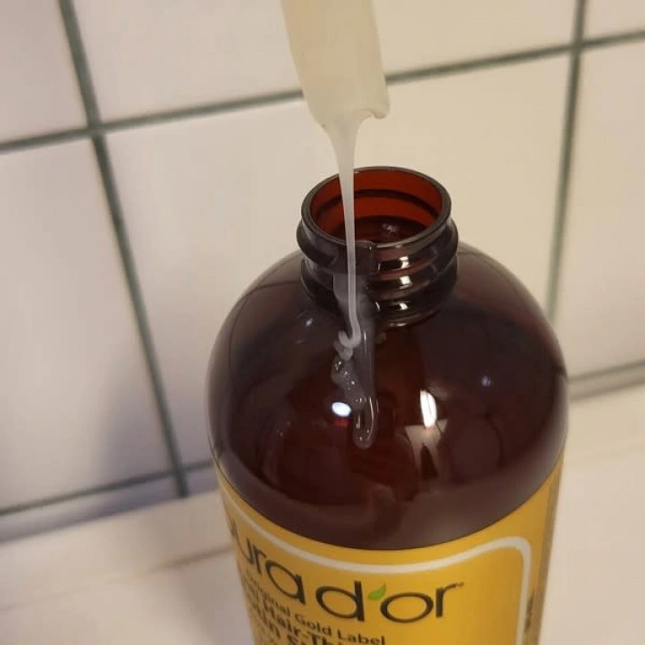 Szampon przeciw łysieniu z biotyną, rozmarynem, palmą sabałową, Fo-Ti, cynkiem, Pura Dor
